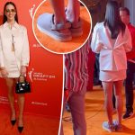 Caitlin Clark swaps Prada heels for Uggs at WNBA draft red carpet