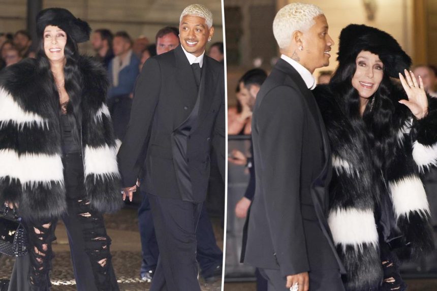 Cher, 77, and boyfriend Alexander 'AE' Edwards, 38, pack on the PDA at Dolce & Gabbana event in Milan