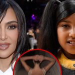 Kim Kardashian Poses in Gold Minidress in Pics Taken by North West