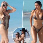 Kim and Khloé Kardashian wear matching snakeskin swimsuits during Turks and Caicos vacation