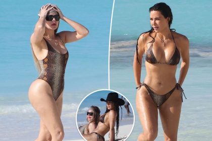 Kim and Khloé Kardashian wear matching snakeskin swimsuits during Turks and Caicos vacation