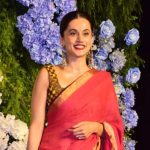 Post wedding with Mathias Boe, Taapsee Pannu flaunts a stunning red saree look as she graces Anand Pandit's daughter's wedding reception - See photos | Hindi Movie News