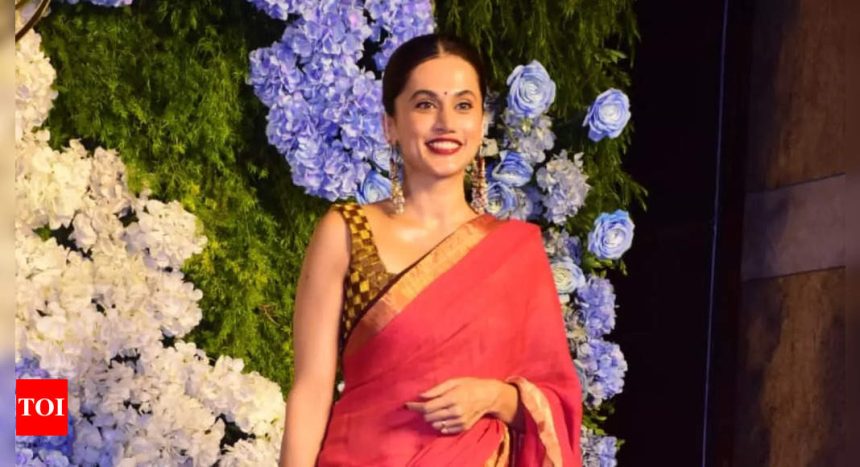 Post wedding with Mathias Boe, Taapsee Pannu flaunts a stunning red saree look as she graces Anand Pandit's daughter's wedding reception - See photos | Hindi Movie News