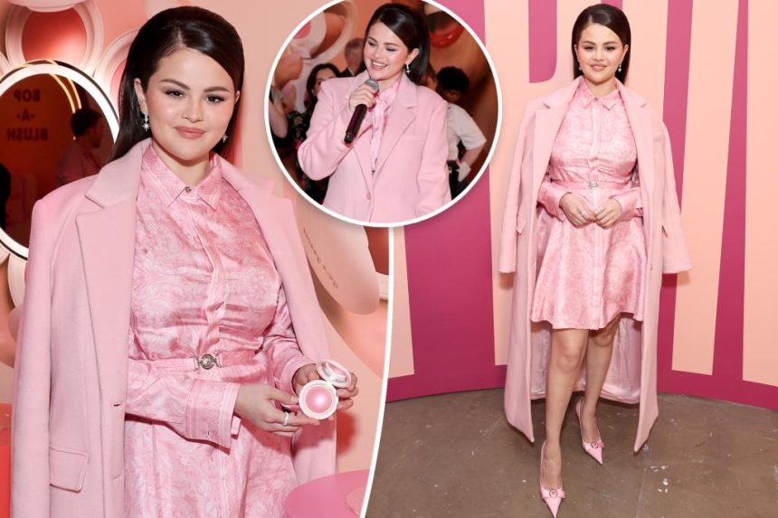 Selena Gomez matches her all-pink outfit to her blush at Rare Beauty event