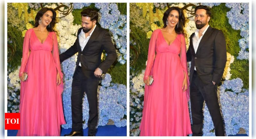 Sizzling 'Murder' duo Emraan Hashmi and Mallika Sherawat chat candidly, strike a pose for the paparazzi together at Anand Pandit's daughter's wedding reception - See photos |