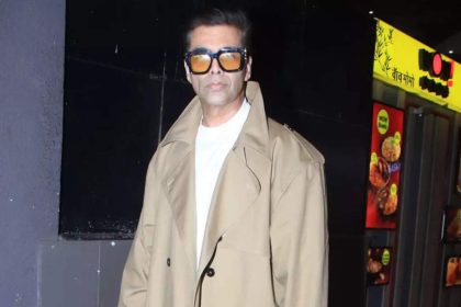 Karan Johar turns heads at Mumbai airport in a stylish trench coat | Hindi Movie News