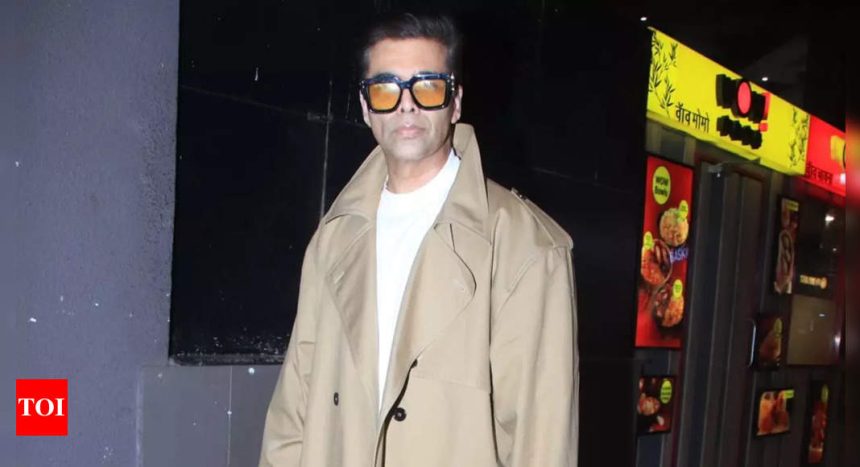 Karan Johar turns heads at Mumbai airport in a stylish trench coat | Hindi Movie News