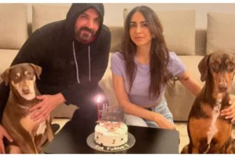 John Abraham and wife Priya Runchal pose for the cutest family picture as they celebrate their pooch's birthday |