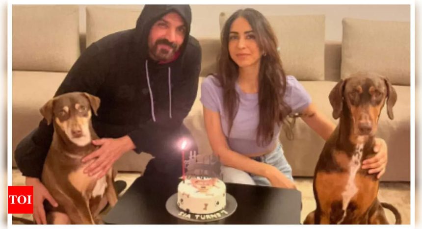 John Abraham and wife Priya Runchal pose for the cutest family picture as they celebrate their pooch's birthday |