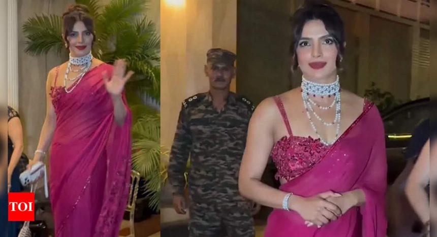 Priyanka Chopra exudes grace and elegance in a magenta saree, schools security for pushing paps at her brother's wedding festivities