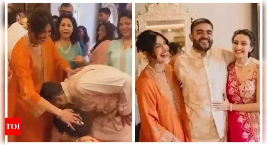 Priyanka Chopra looks gorgeous in orange kurta set as she blesses Siddharth Chopra and Neelam Upadhyaya on their engagement - WATCH inside video |