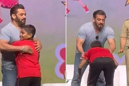 Salman Khan gives a hug to a young fan on stage as he touches his feet at Ganesh Chaturthi event