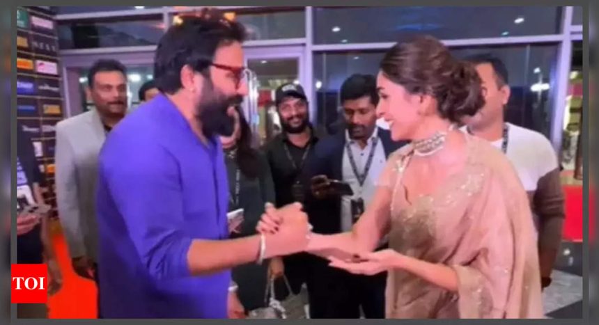 Video of Mrunal Thakur and Sandeep Reddy Vanga bumping into each other at an event goes viral; fans say, 'A movie together please' - WATCH |