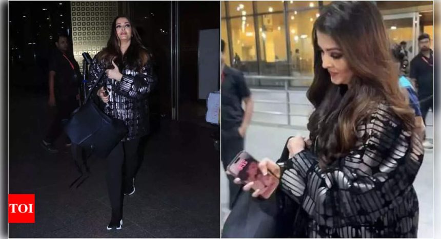 Did Aishwarya Rai Bachchan choose Aaradhya and Amitabh Bachchan's photo as her phone wallpaper? Netizens think so | Hindi Movie News