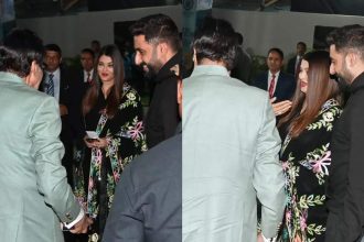 Abhishek Bachchan turns protective husband for Aishwarya Rai Bachchan as they arrive with Amitabh Bachchan at Aaradhya's annual day function - WATCH VIDEOS | Hindi Movie News