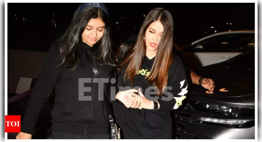 Aishwarya Rai and daughter Aaradhya Bachchan twin in hoodies as they jet out of the city; wish Paparazzi ‘Merry Christmas and Happy New Year’ |