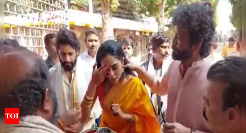 Nagarjuna holds Sobhita Dhulipala's hair back as temple priest applies bottu to her forehead, sparks mixed reactions online | Telugu Movie News