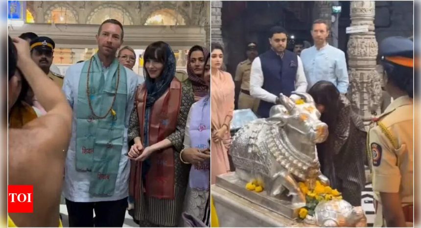 Chris Martin and Dakota Johnson visit Shri Babulnath Temple ahead of Coldplay's India concerts: Watch videos | English Movie News