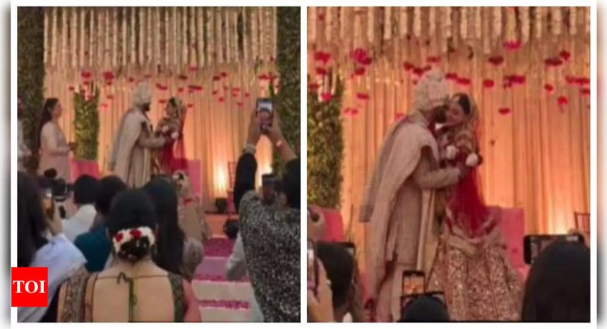 Priyanka Chopra's brother Siddharth Chopra kisses his bride Neelam Upadhyaya after jaimala ceremony- WATCH video |