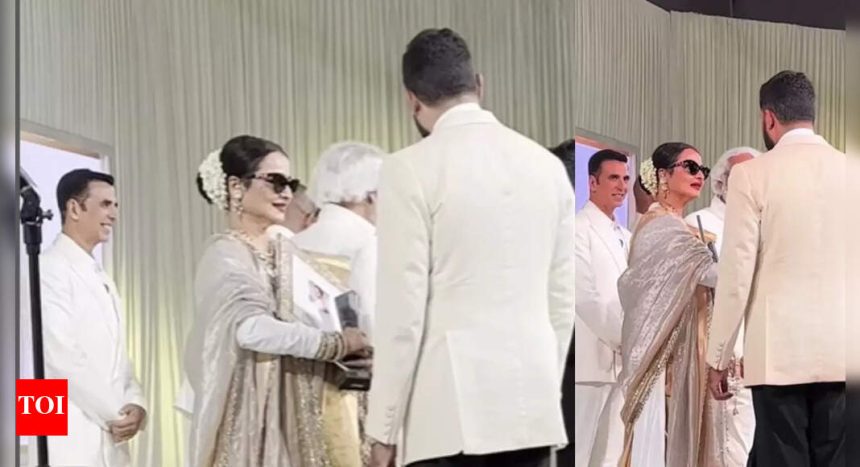 Netizens wonder why Rekha ignored Akshay Kumar while she hugged Abhishek Bachchan and greeted Shikhar Dhawan, as the video goes viral | Hindi Movie News