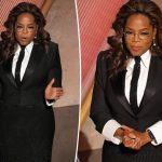 Oprah Winfrey puts a twist on tuxedo dressing with bedazzled skirt on Oscars 2025 stage